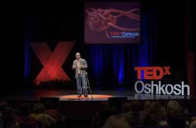 Michael on TEDxOshkosh stage